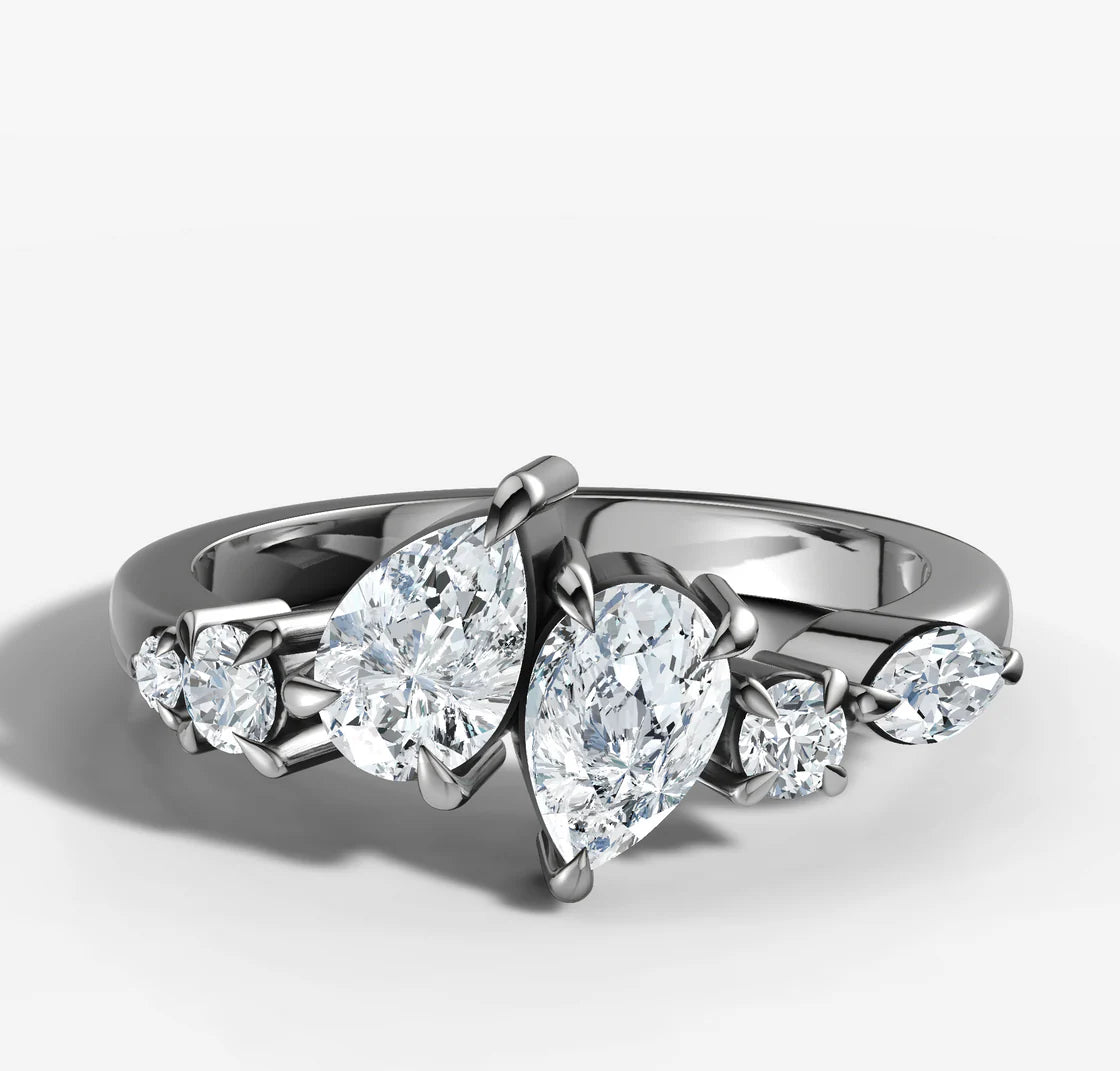 Pear Cut Diamonds Offset Ring