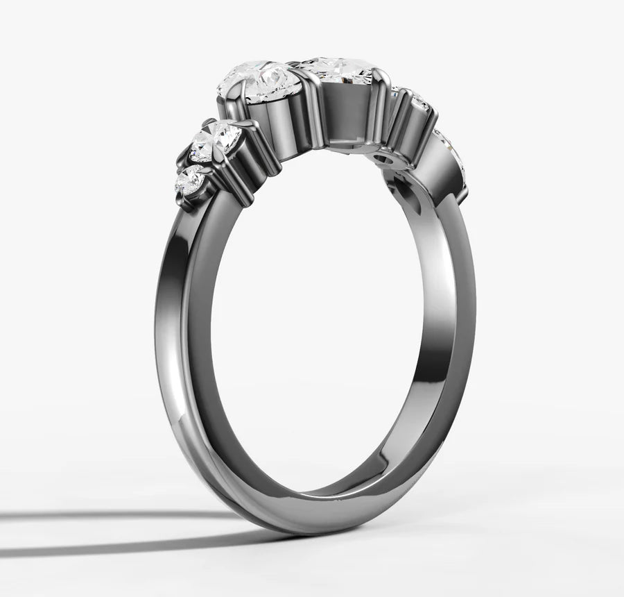 Pear Cut Diamonds Offset Ring