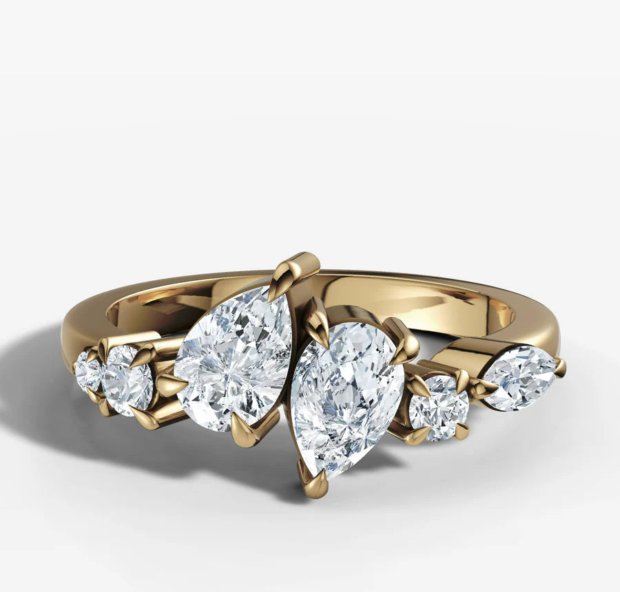 Pear Cut Diamonds Offset Ring