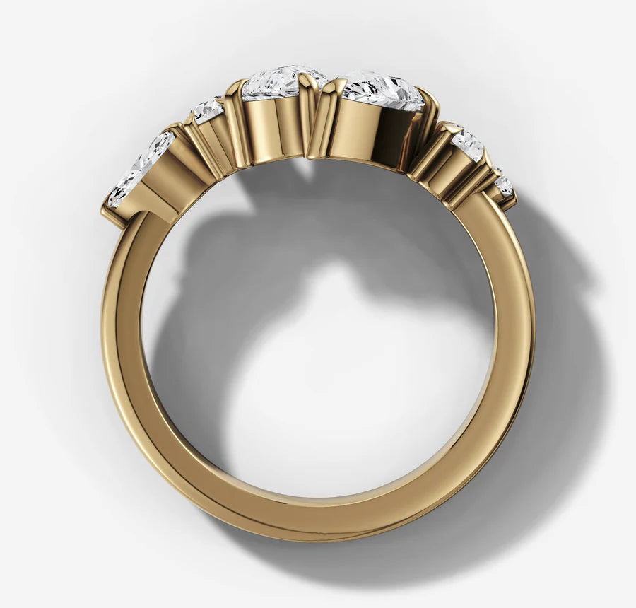 Pear Cut Diamonds Offset Ring