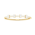 Oval Diamond Bangle Bracelet in Yellow Gold | Classic Open-Top Design | Elegant Fine Jewelry