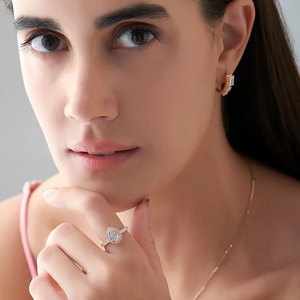 Gold Pear Diamond Ring for Women – Halo Setting with Sparkling Side Stones