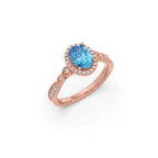 Blue Oval Gemstone Ring in Yellow Gold – Halo Diamond Design