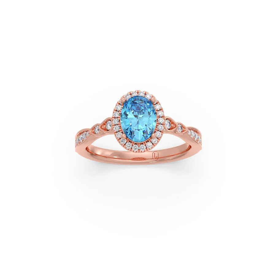 Blue Oval Gemstone Ring in Yellow Gold – Halo Diamond Design