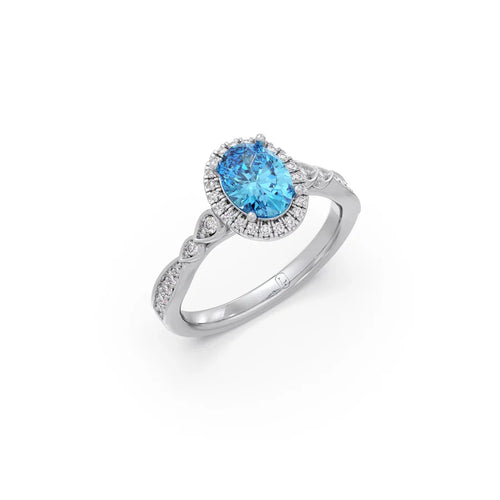 Blue Oval Gemstone Ring in Yellow Gold – Halo Diamond Design