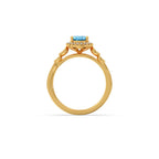 Blue Oval Gemstone Ring in Yellow Gold – Halo Diamond Design