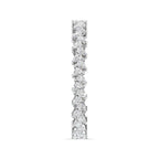 Pair of Gold Bangles with Illusion Set Pear Diamonds